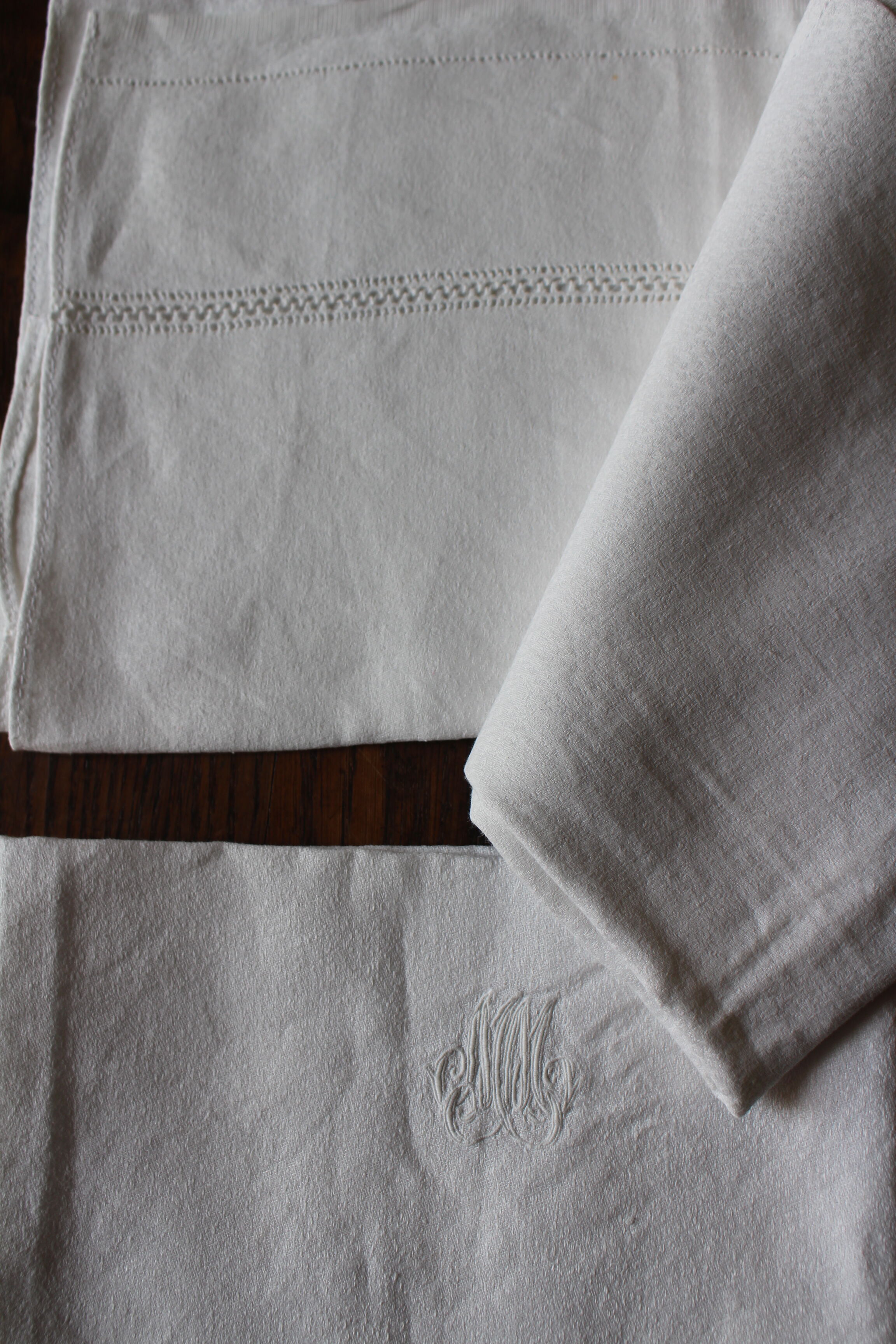 A batch of 2 White Checkered Napkins Monograms M M