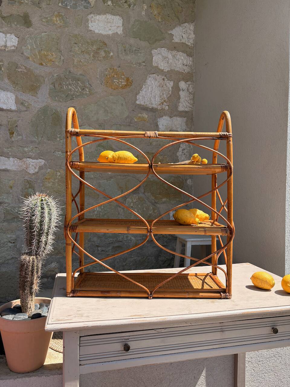 Vintage wall shelf in rattan