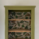 Meuble de rangement vintage en bois vert