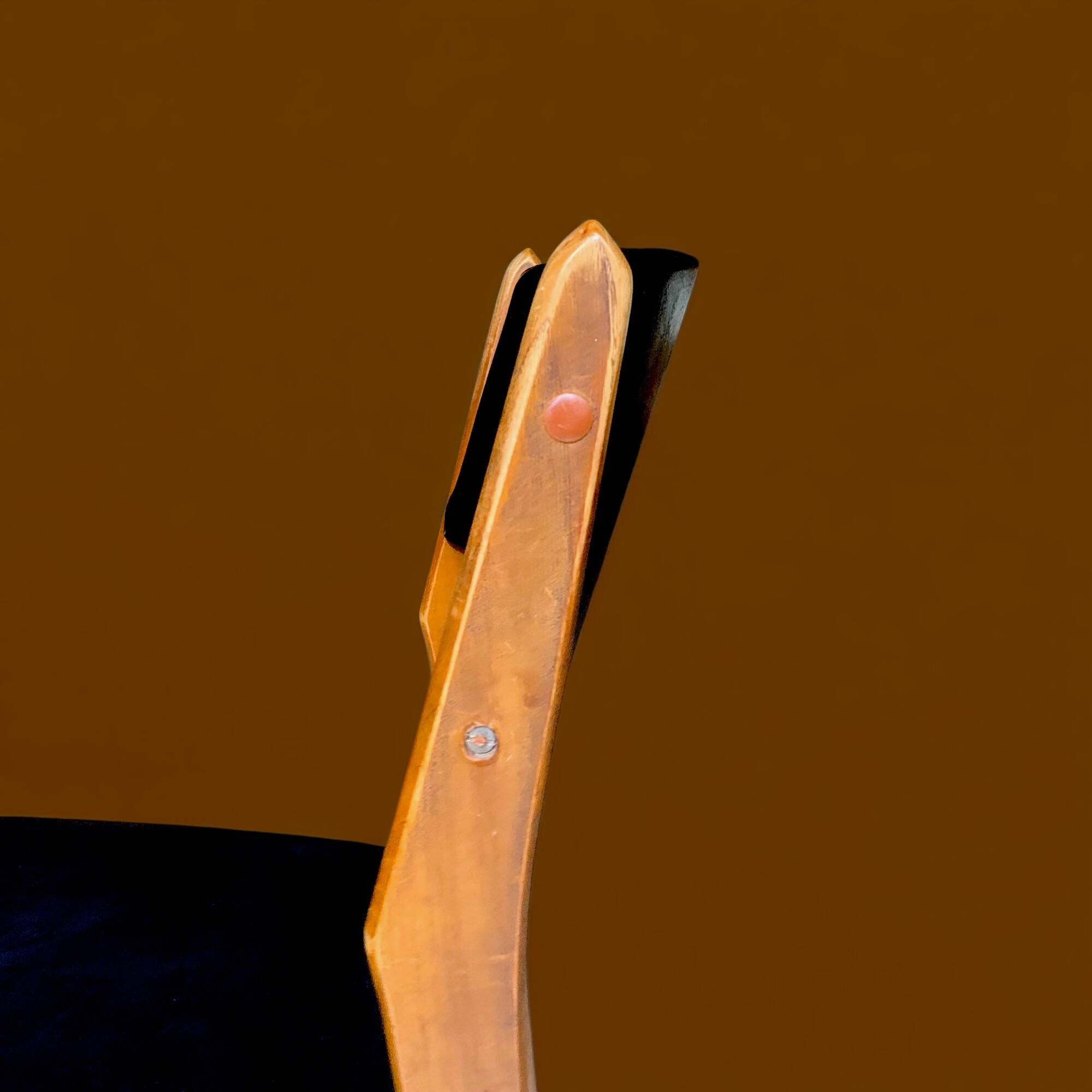 Pair of Scandinavian chairs in wood and black skai