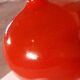 Vase rouge en céramique émaillée