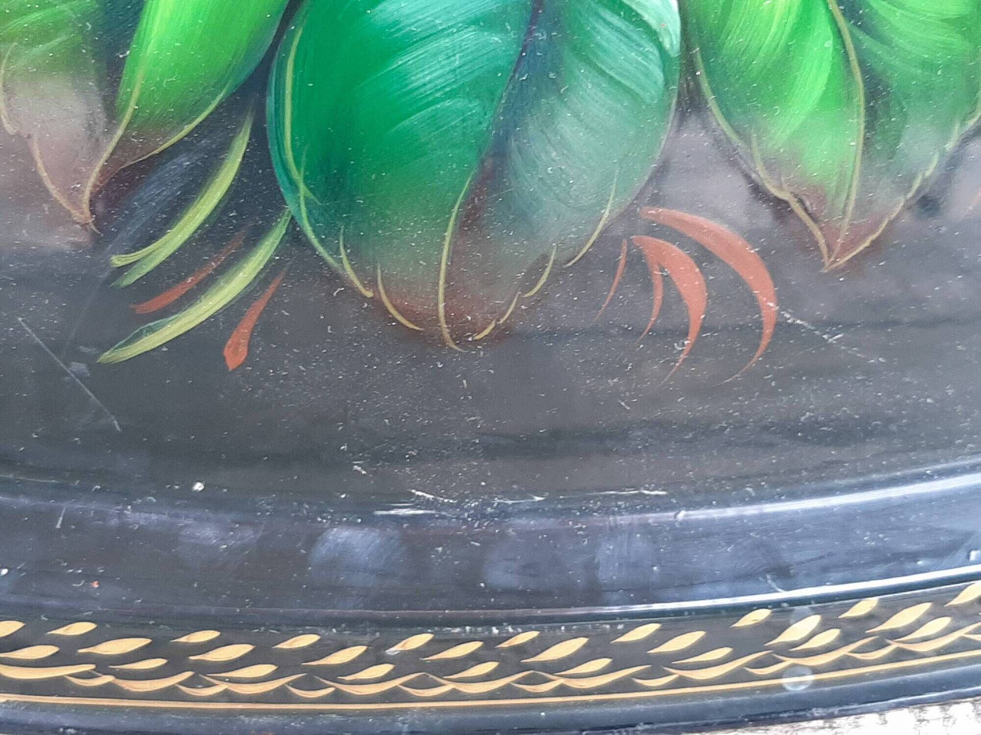 Black lacquered metal tray with multicoloured vintage Russian floral decoration.