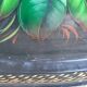Black lacquered metal tray with multicoloured vintage Russian floral decoration.