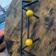 Vintage coat rack Roger Feraud with 4 yellow ball hooks.