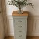 Louis-Philippe style chiffonnier in grey-green, wooden top.