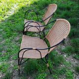 Paire de fauteuils en rotin et fer forgé