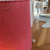 Suspension in fabric stretched over celluloid, strawberry red crushed