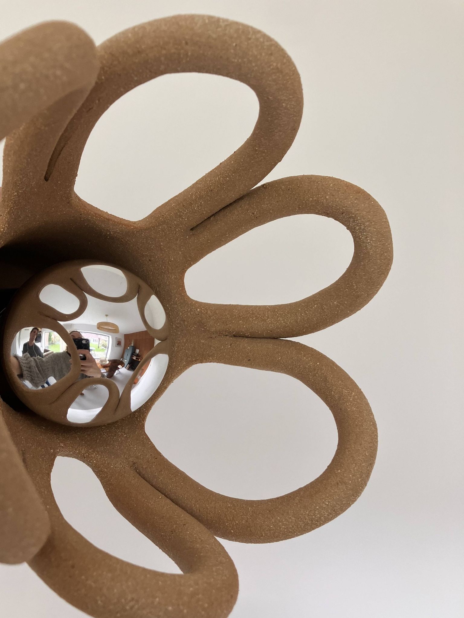 Suspension in the shape of a flower made of handcrafted ceramic, raw red stoneware mid-century.