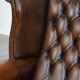 Fauteuil Chesterfield en cuir de vache marron de style anglais