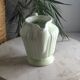 Green ceramic milk jug