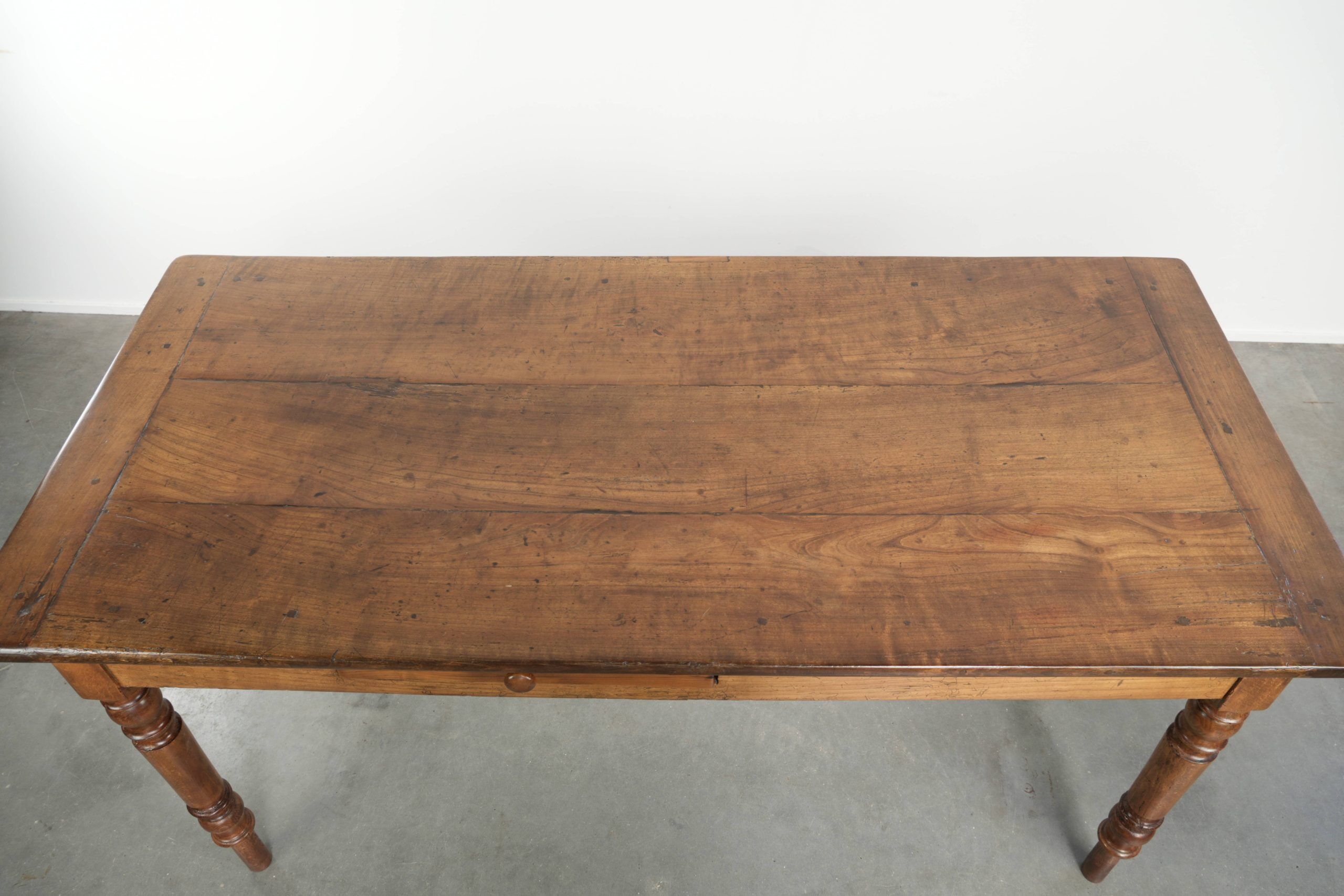 Antique French cherry wood dining table from the 19th century