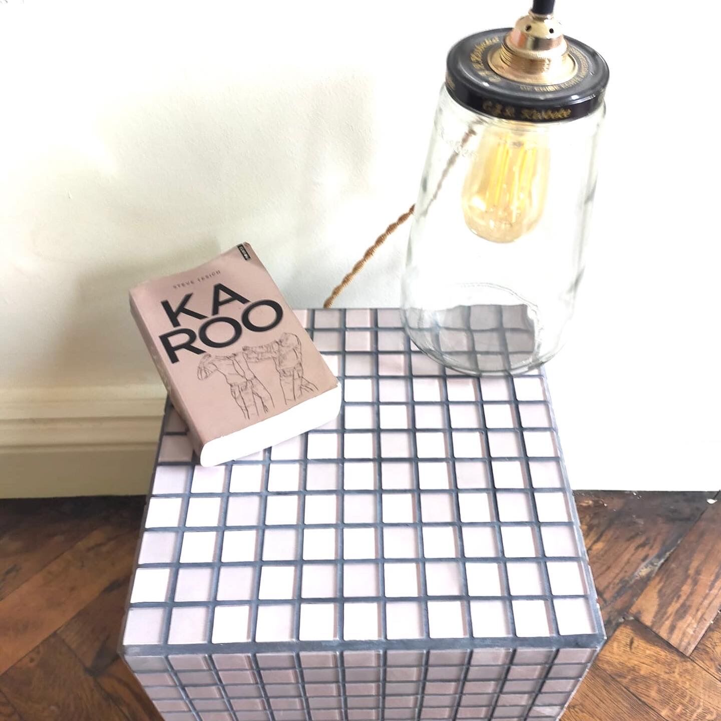 Ceramic tile cube, stool end of sofa