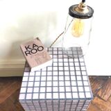 Ceramic tile cube, stool end of sofa