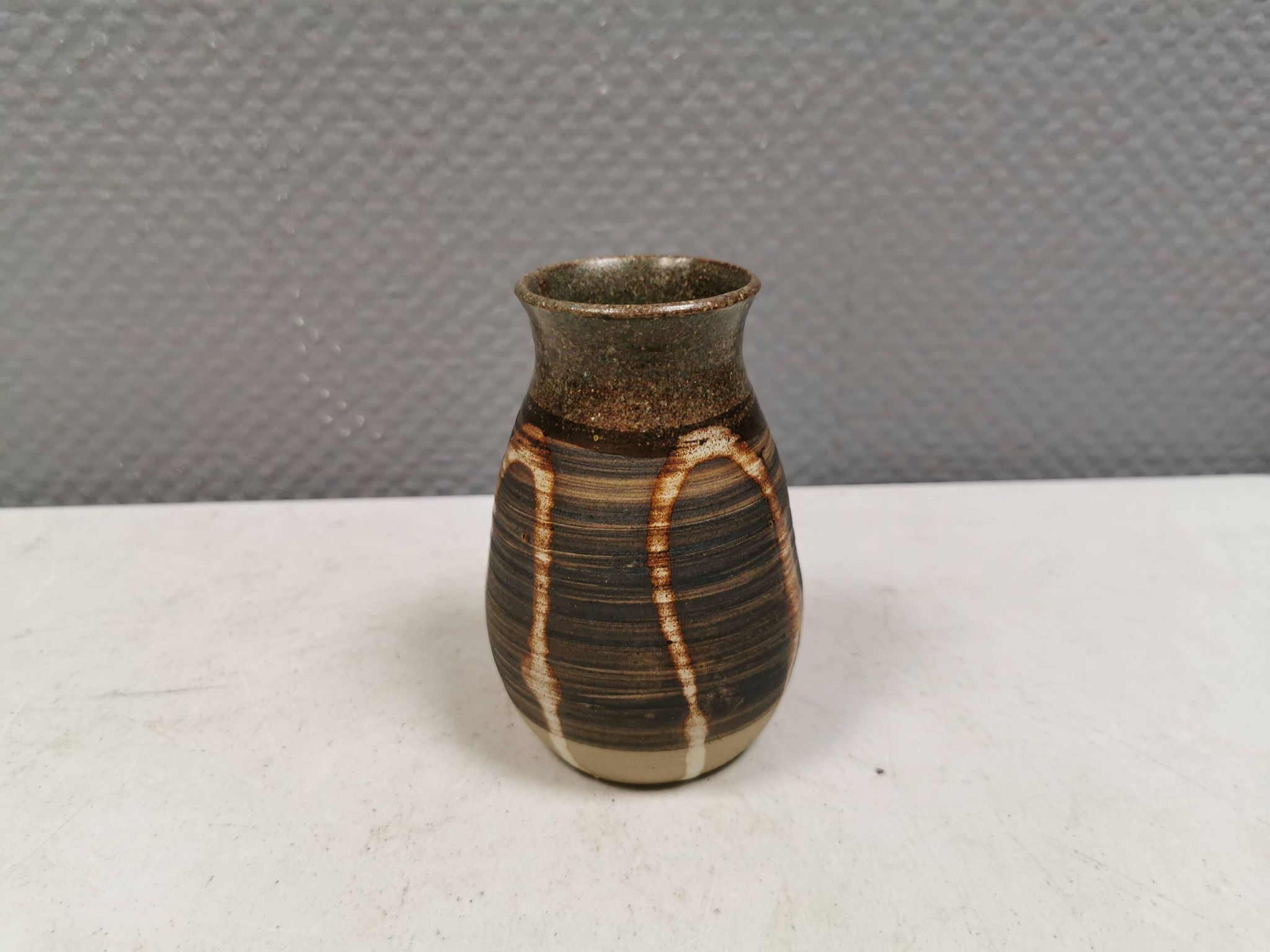 Small ceramic vase with "runny" glaze. Denmark 1980s.