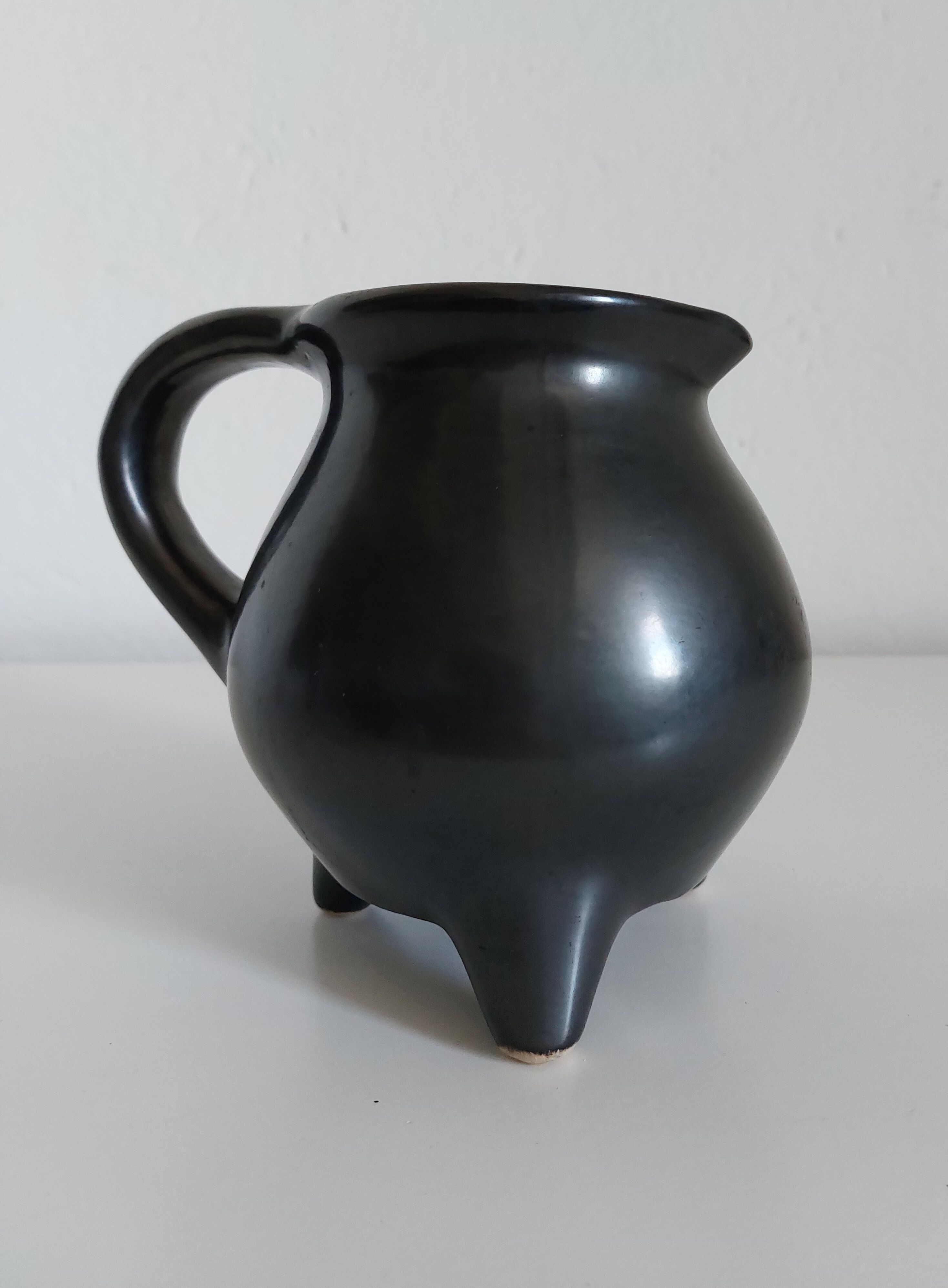 Vintage satin black tripod vase