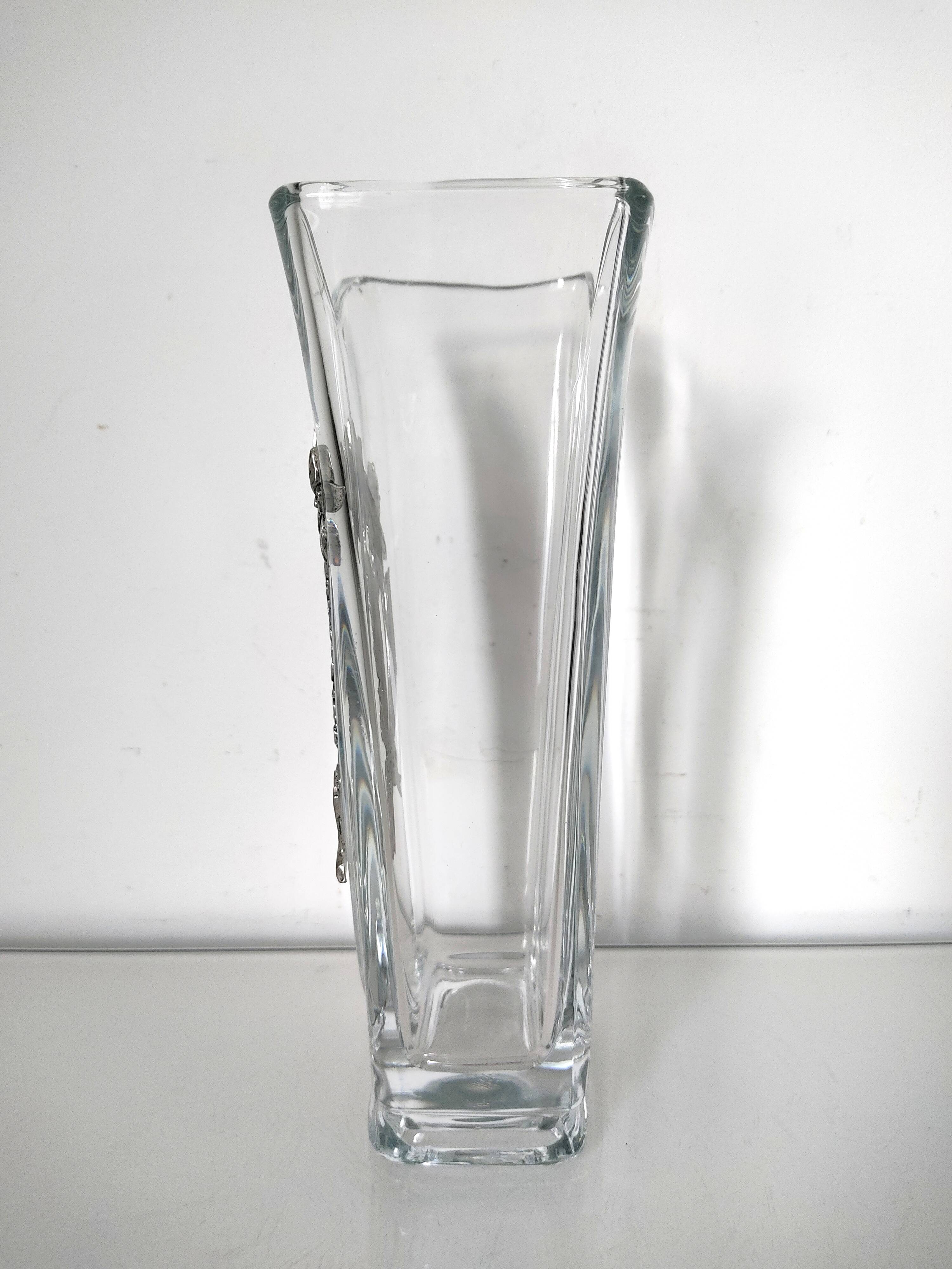 Glass vase with metal flower application