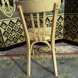 Suite of 6 bistro chairs signed "baumann"