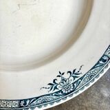 Plat rond creux Longchamp en terre de fer, service "Lily"