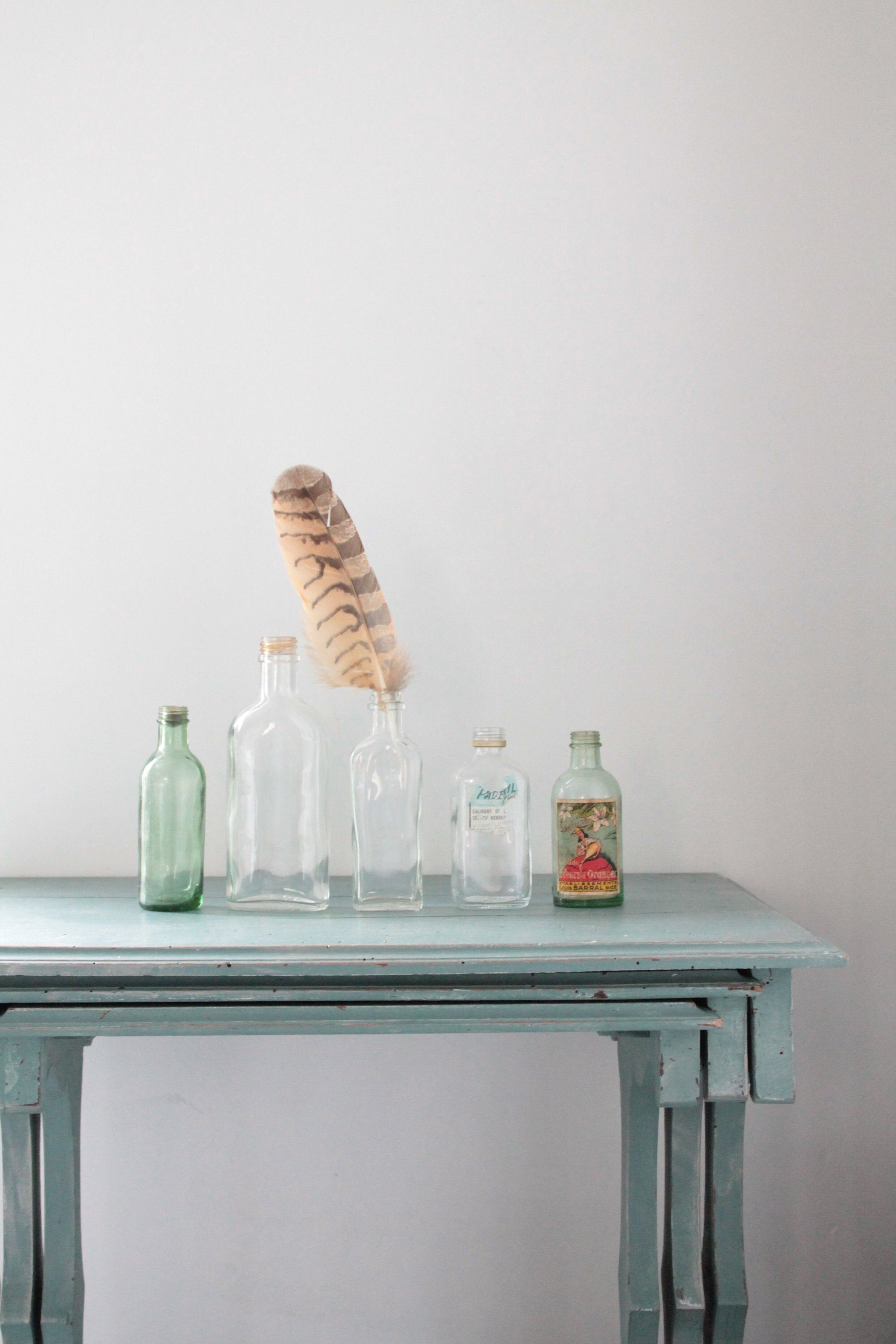Collection de 7 Bouteilles anciennes en verre