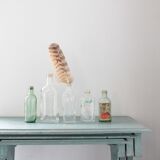 Collection of 7 old glass bottles