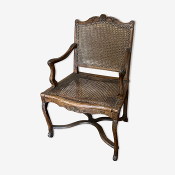 Old Louis XV style armchair with cannage