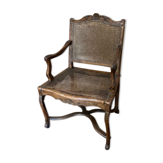 Old Louis XV style armchair with cannage