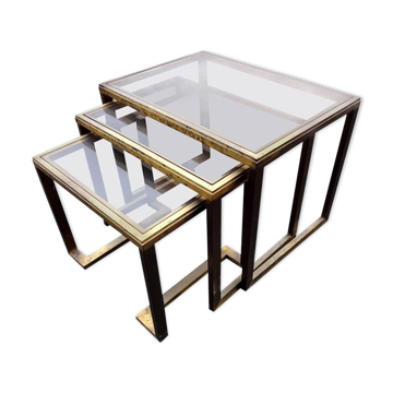 Pull-out tables in brass