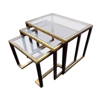 Pull-out tables in brass