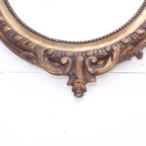 Miroir 19 ème bois et stuk doré ovale 97x62cm