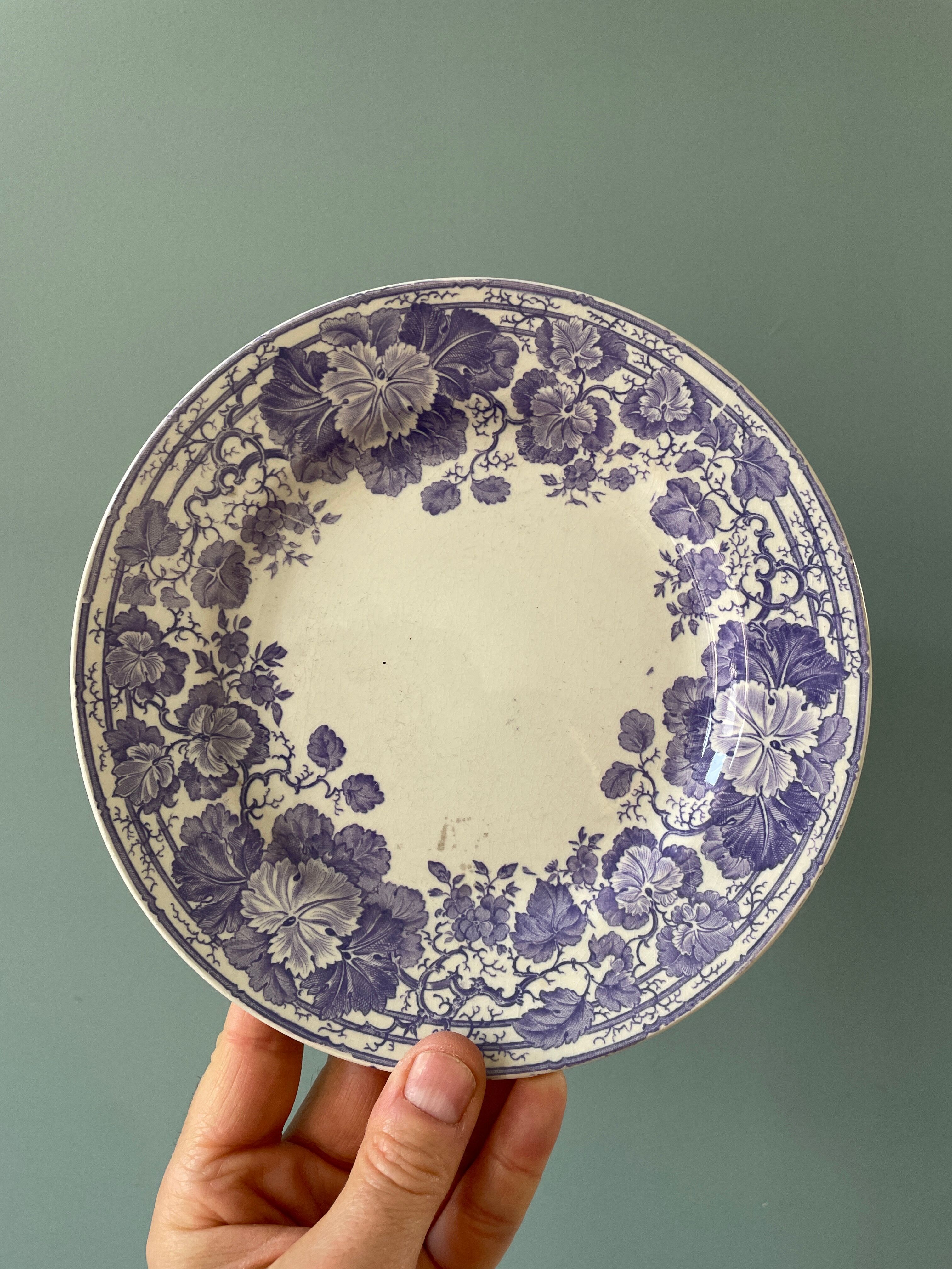 Series of 12 mismatched Terre de Fer dessert plates