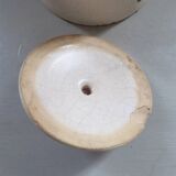 Old earthenware pitcher with its lid
