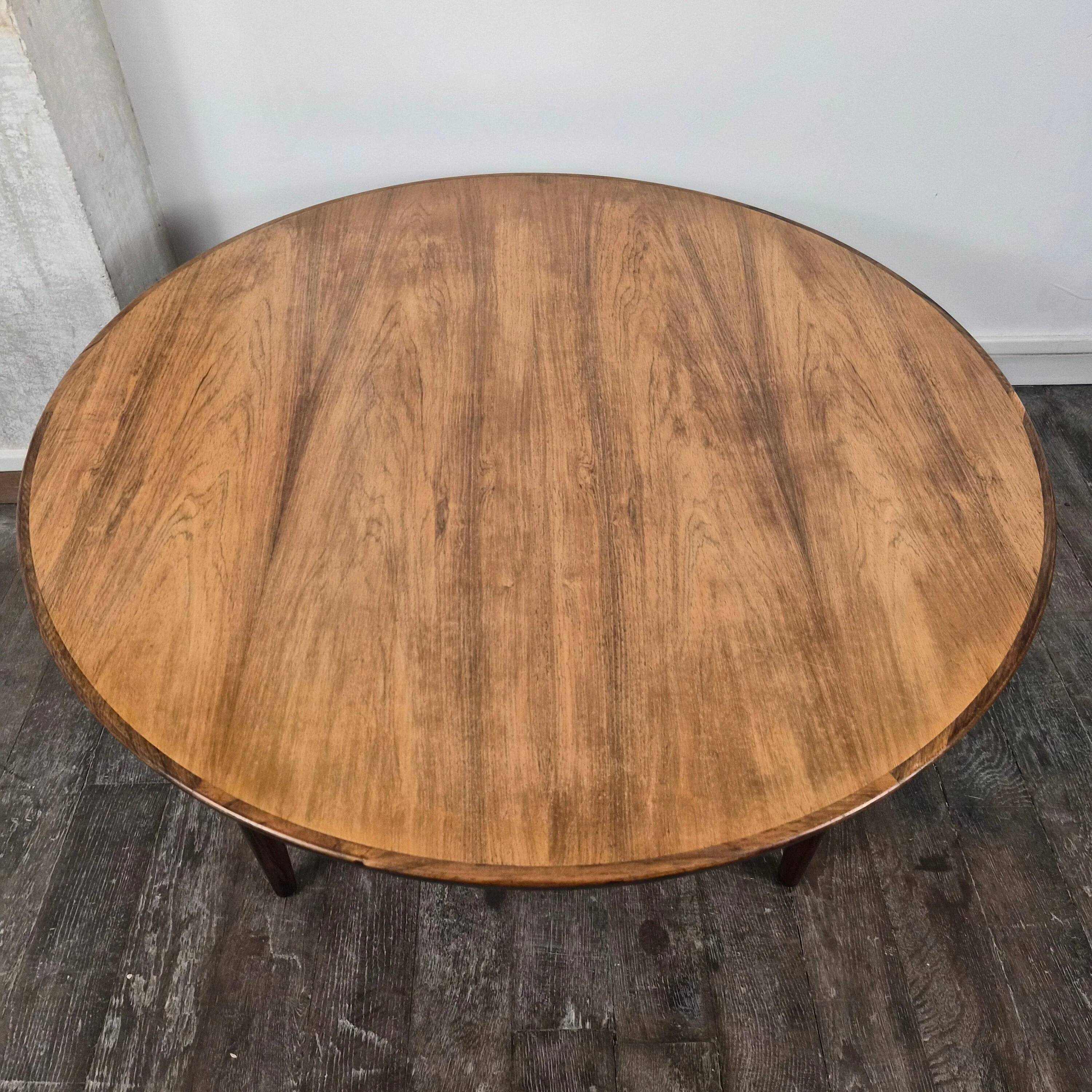Round rosewood coffee table with adjustable height, Denmark, 1960.