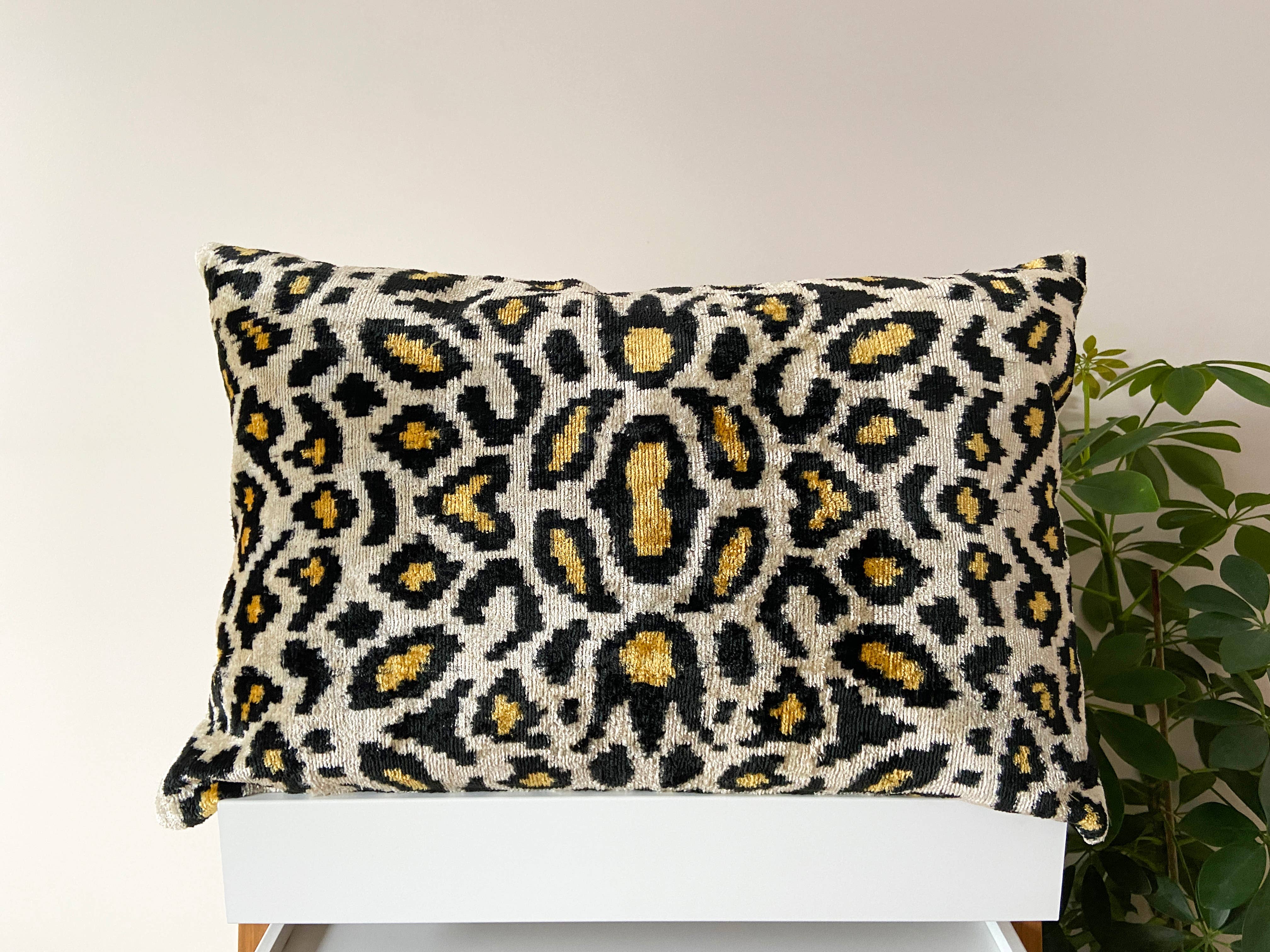 Ikat cushion in panther velvet