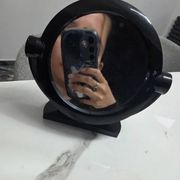 Vintage round pivoting mirror in black, retro style from the 70s/80s.