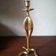 Candlestick mounted on brass cobra