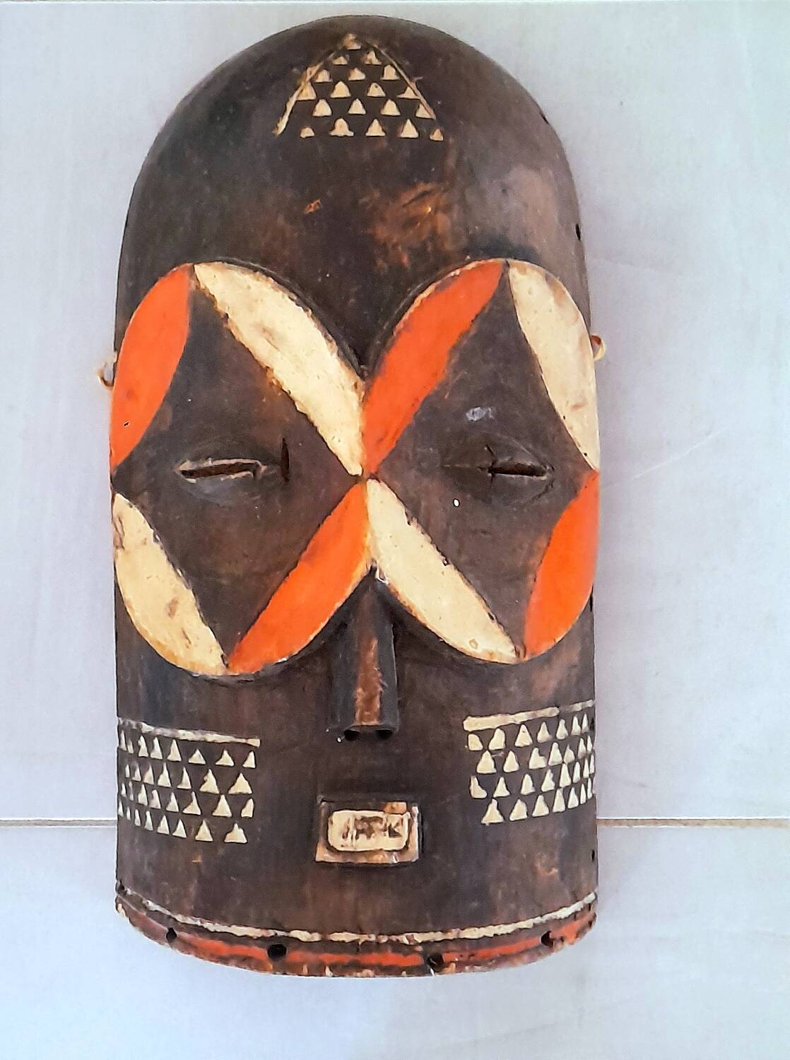 African mask carved from wood