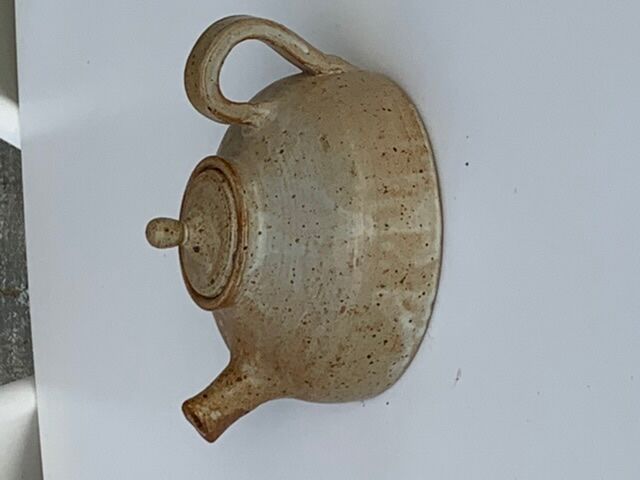 Vintage teapot in reeds