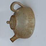 Vintage teapot in reeds