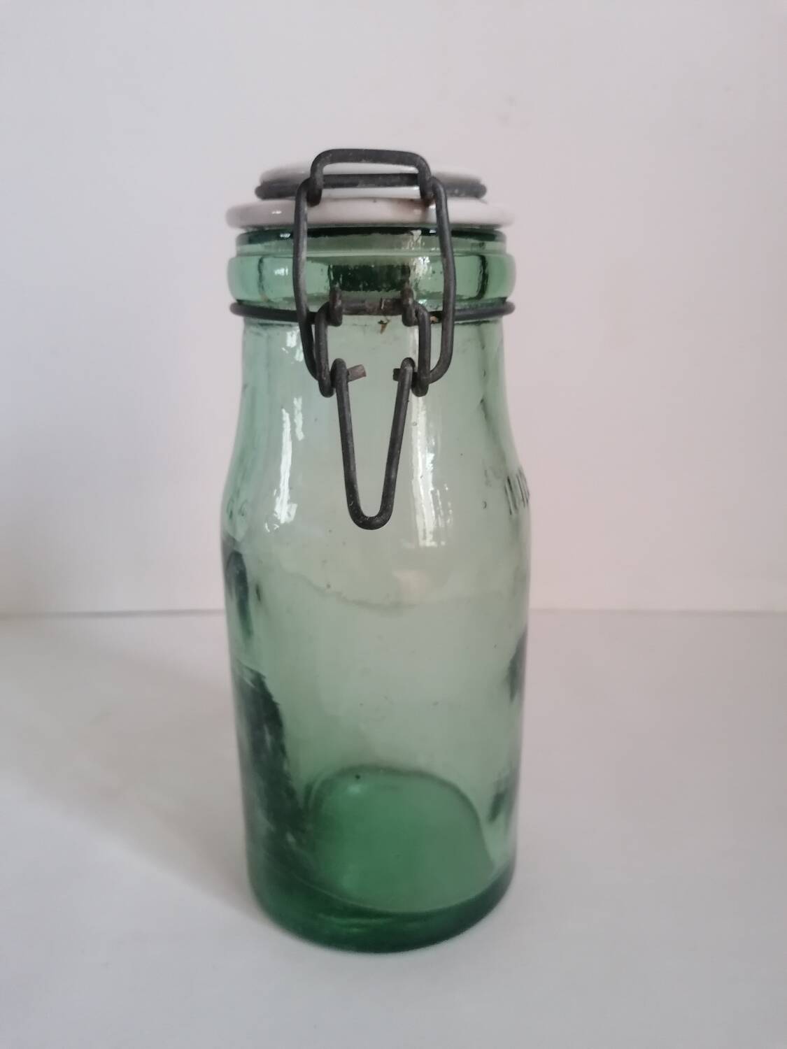 Old jar the ideal green glass