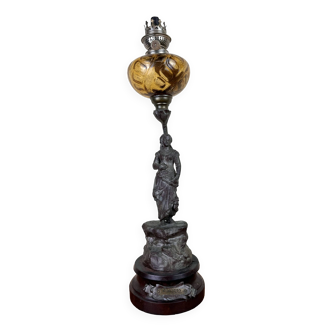 Large kerosene lamp mounted on a spelter statue entitled "Chanson par Rousseau" circa 1900