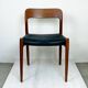 A beautiful pair of modern Scandinavian dining chairs in teak, model 75 by Niels Otto Møller.