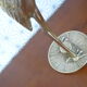 Heron in vintage brass