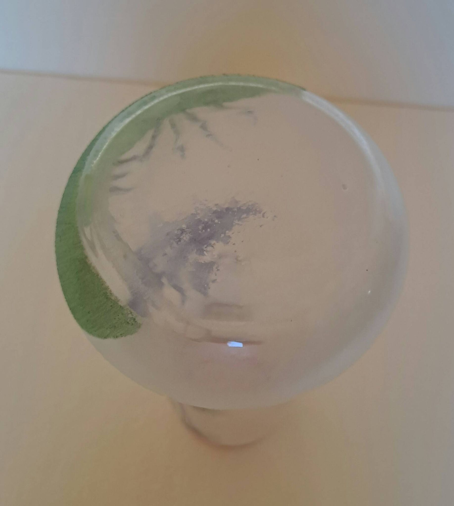 Frosted glass vase enhanced by hand