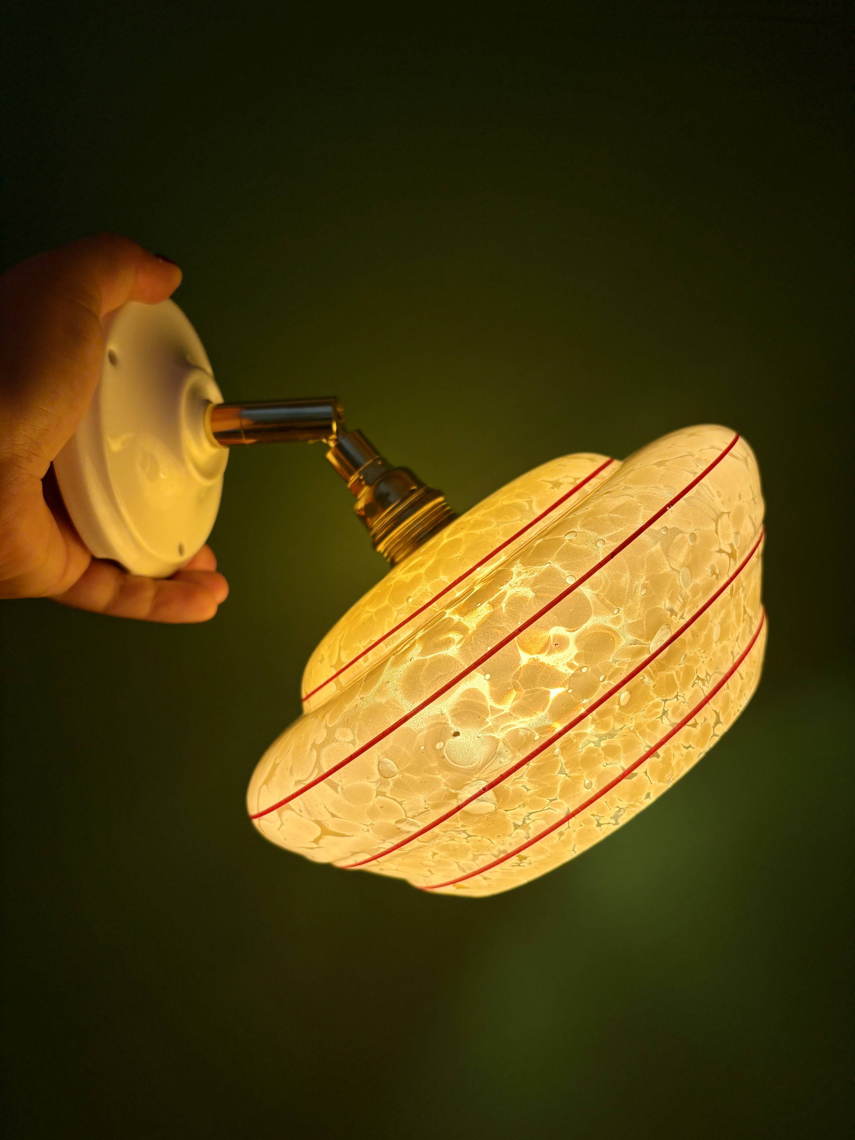 Vintage wall lamp with yellow clichy glass shade and red trim