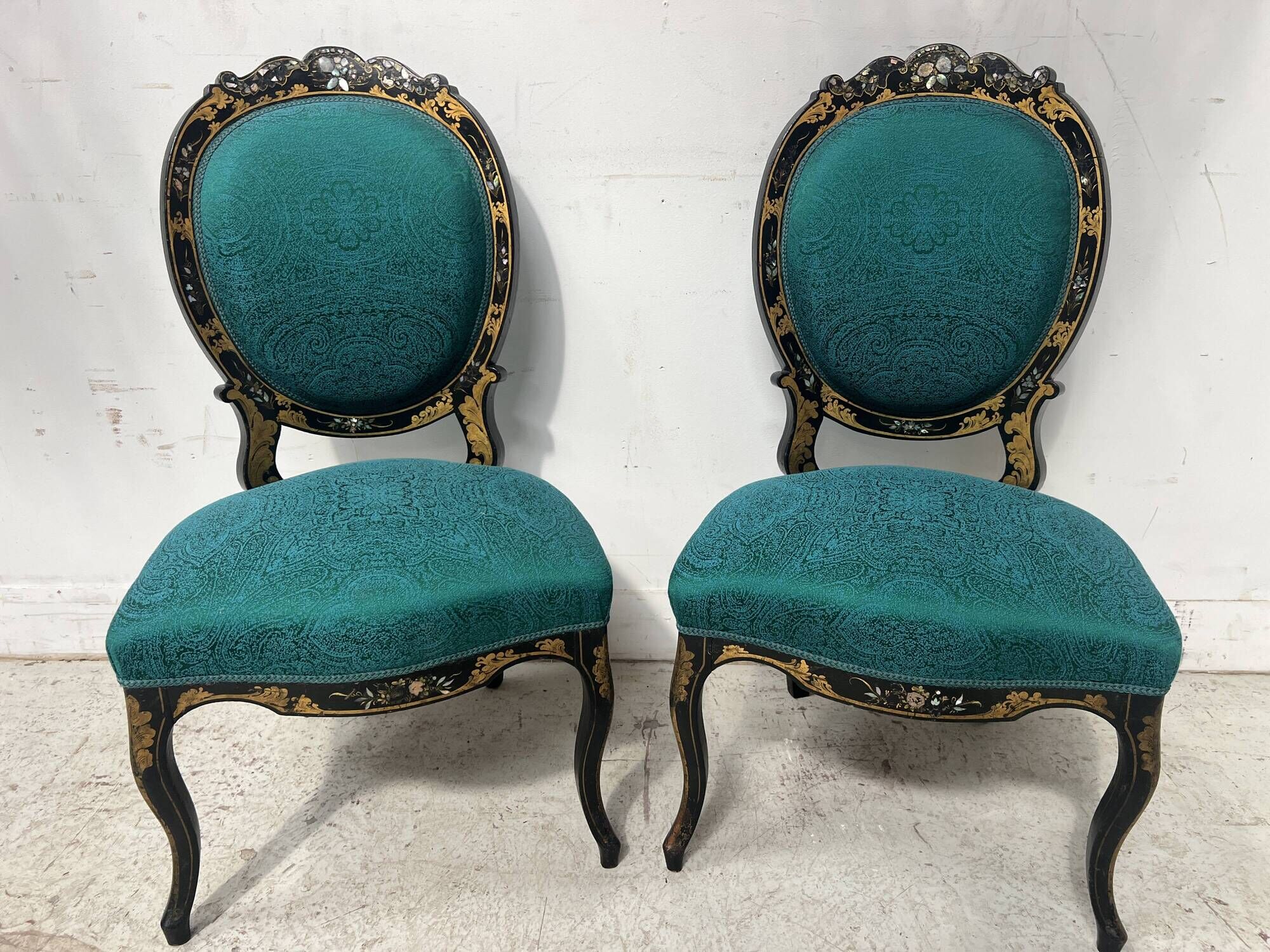 Pair of Napoleon III chairs in black lacquered wood, 19th century.