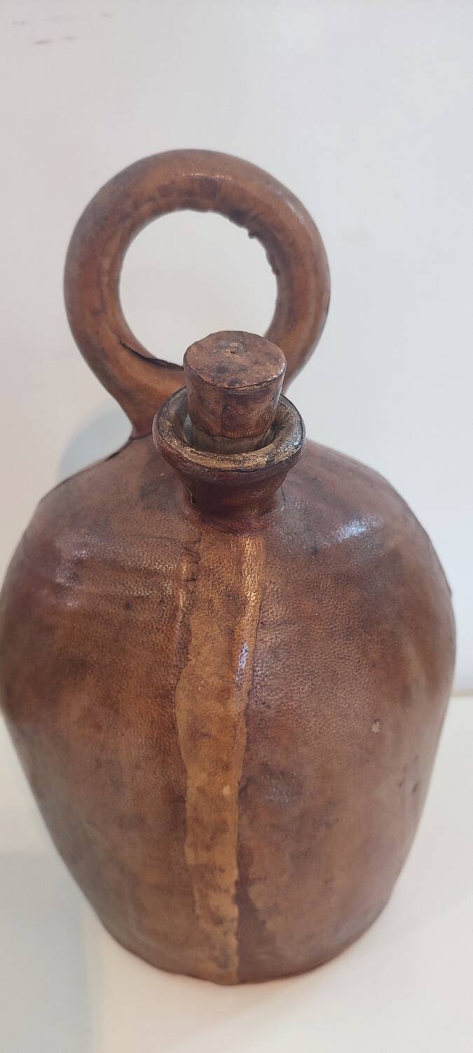 Gargoulette, terracotta jug covered with leather