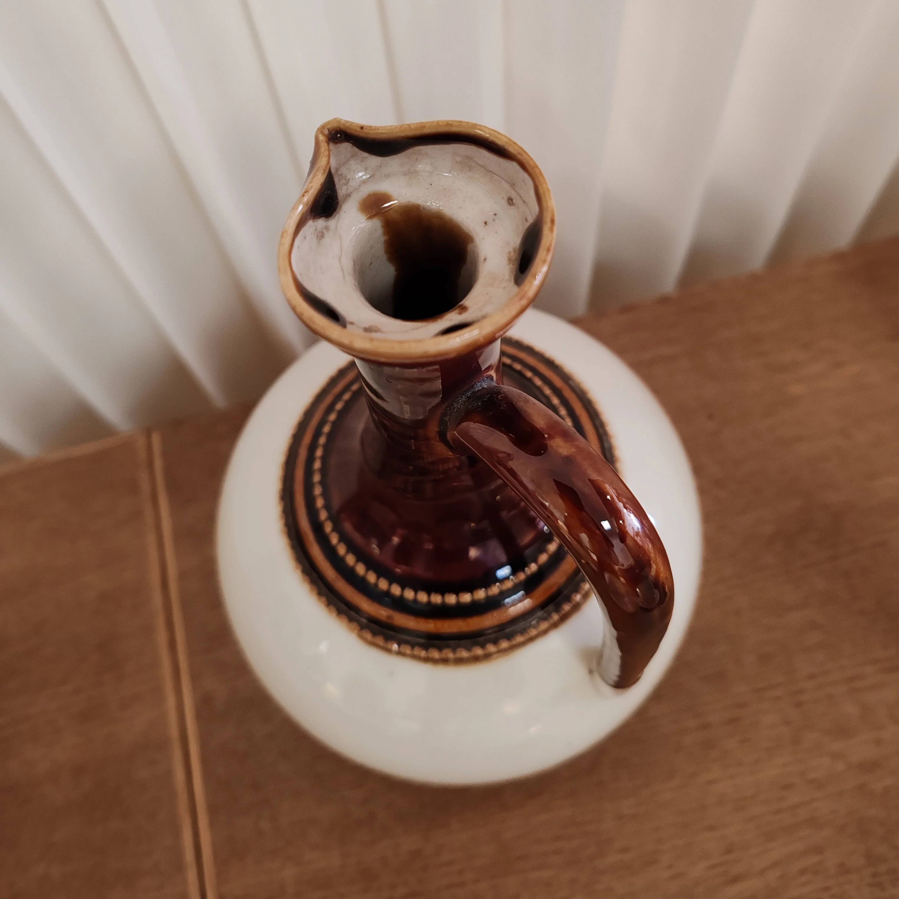 Old oil and vinegar jug