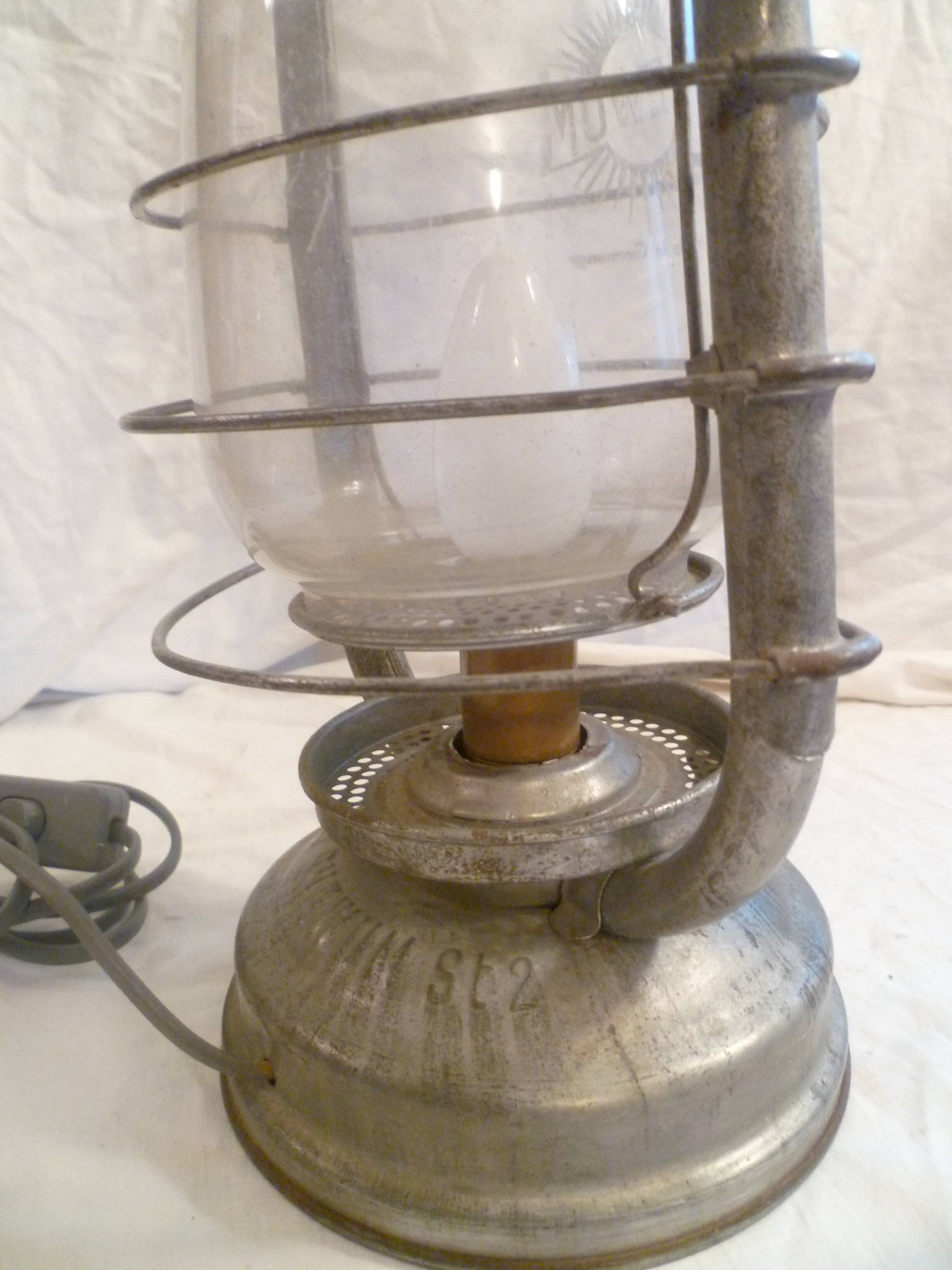 Vintage glass/metal storm lamp from the brand: rhewum germany