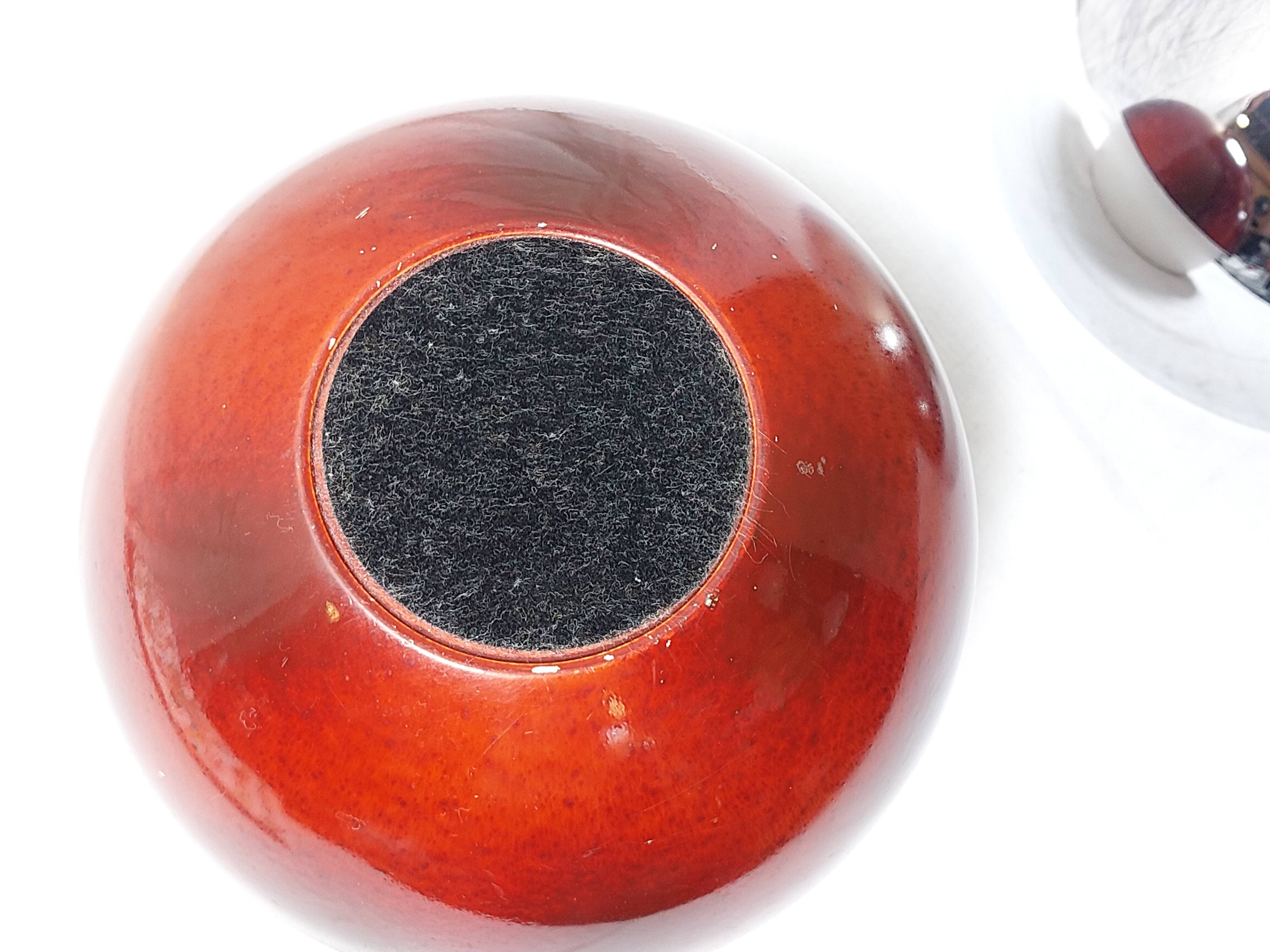 Ice bucket in the shape of an apple, chrome metal and red Bakelite, France, 70s