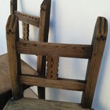 Pair of ethnic crude wooden chairs